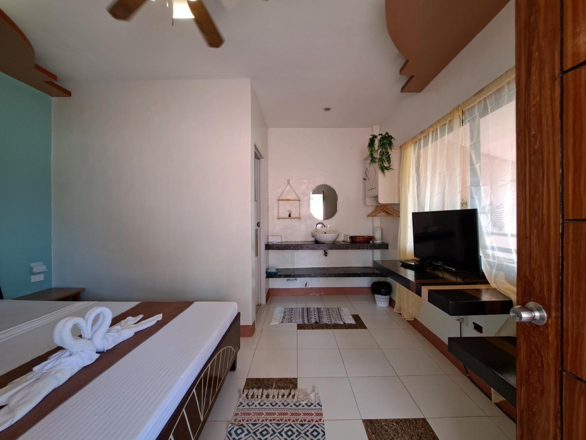 Panari Lodge Ель-Нідо Номер фото